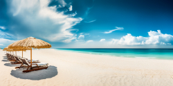 umbrella-and-chair-on-the-beach-with-sea-and-sky-background