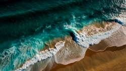 aerial-view-of-the-waves-breaking-on-the-sandy-beach-drone-photography