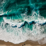 aerial-view-of-beautiful-turquoise-ocean-waves-rolling-on-sandy-beach