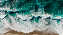 aerial-view-of-beautiful-turquoise-ocean-waves-rolling-on-sandy-beach