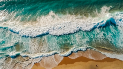 aerial-view-of-a-beautiful-sandy-beach-with-turquoise-ocean-waves-2