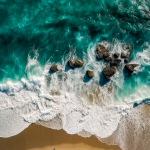 aerial-view-of-beautiful-beach-with-turquoise-water-and-waves