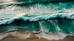 aerial-view-of-a-beautiful-sandy-beach-with-turquoise-ocean-waves-3