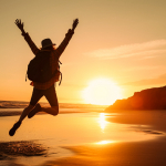 silhouette-of-happy-woman-jumping-on-the-beach-at-sunset