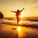 silhouette-of-a-happy-woman-jumping-on-the-beach-at-sunset