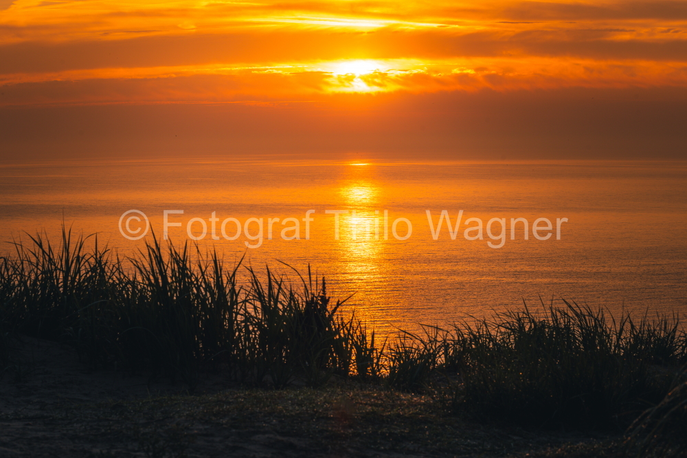Sonnenuntergang am Ostseestrand Sellin auf der Insel Rügen in Mecklenburg-Vorpommern