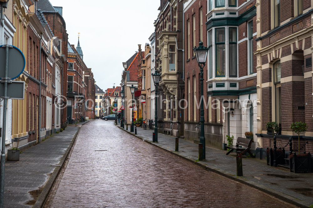 Koornmarkt square and gate in the old city centre of Kampen, Overijssel, Netherlands