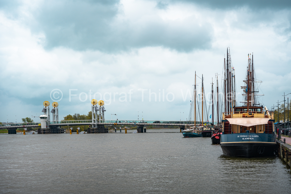 view of the city of kampen from the harbor with schooner netherlands holland