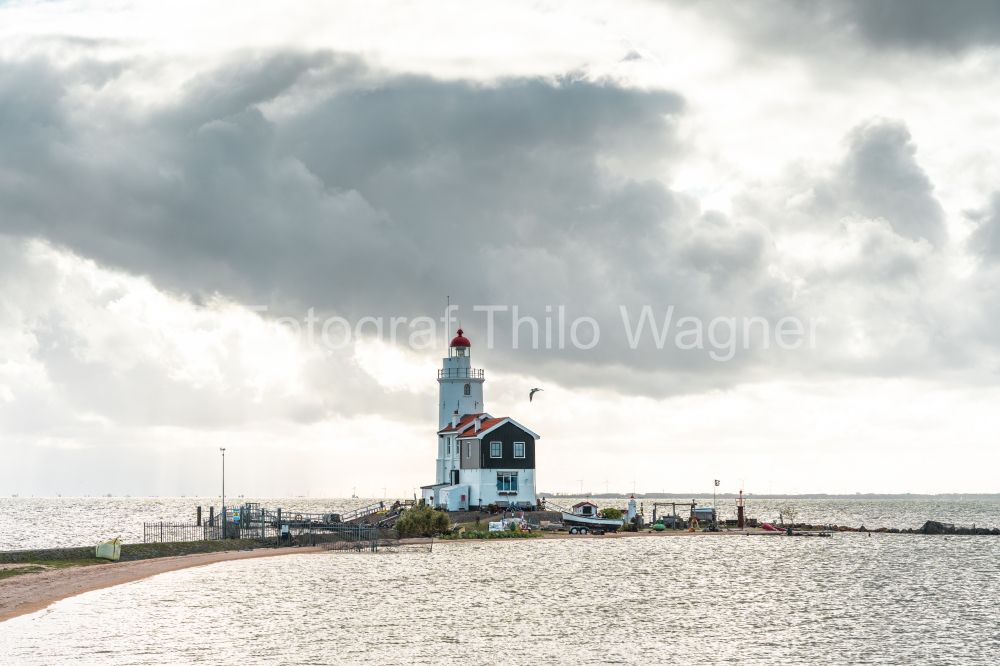 The white lighthouse Paard Van Marken near Marken on the IJsselmeer in the Netherlands. Municipality of Waterland in the province of North Holland.