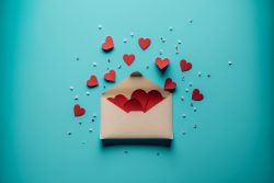 valentine-day-greeting-concept-envelope-and-red-hearts-on-blue-background-top-view-3