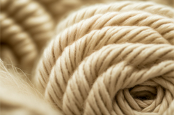 beige-wool-thread-macro-texture-material-blur-background