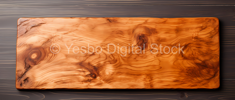 Wooden cutting board on a dark wooden background. Top view.